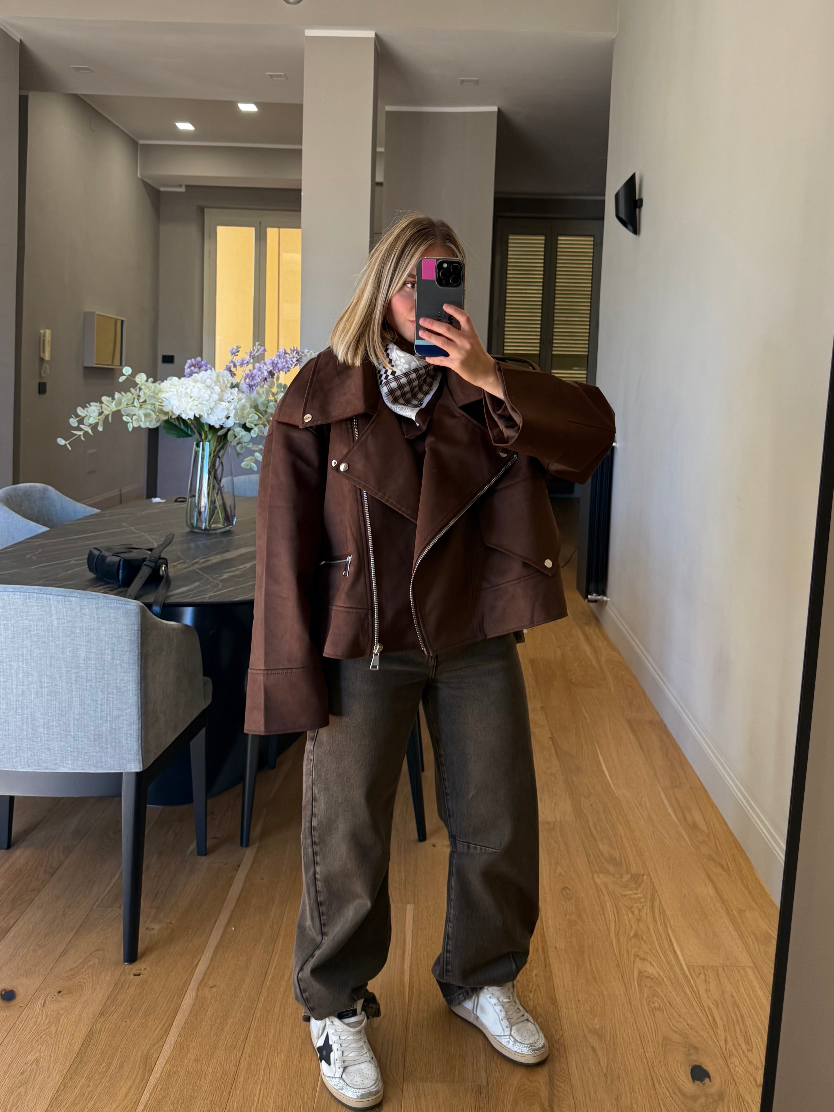 Giubbotto modello chiodo effetto camoscio